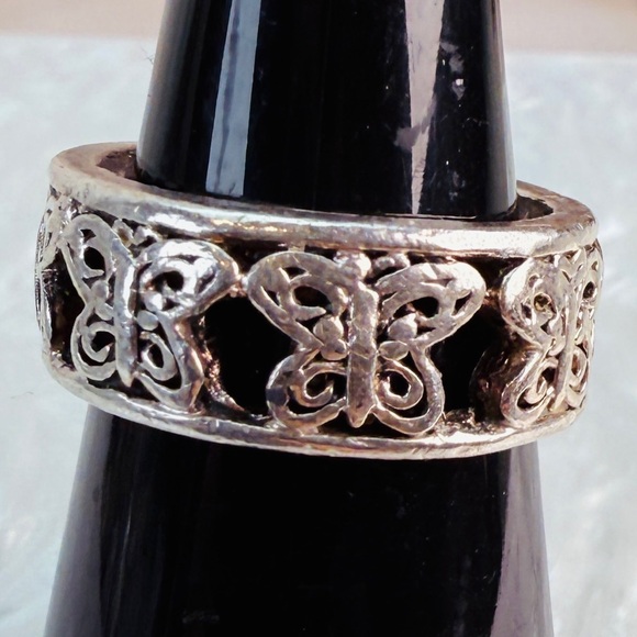 Jewelry - Beautiful Silvertone with cut out butterflies size 7 1/2 costume ring